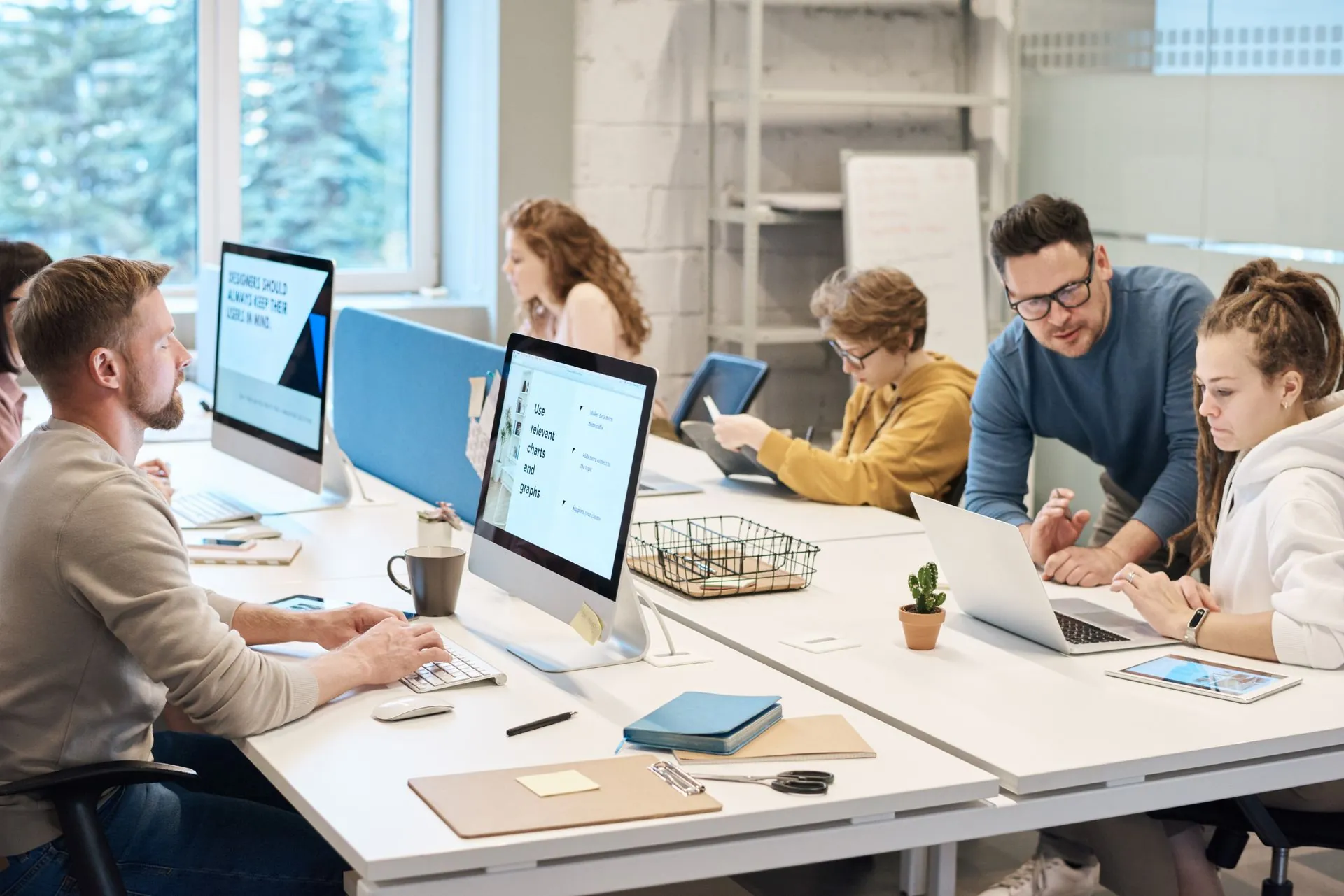 Web design team working in a bright modern office