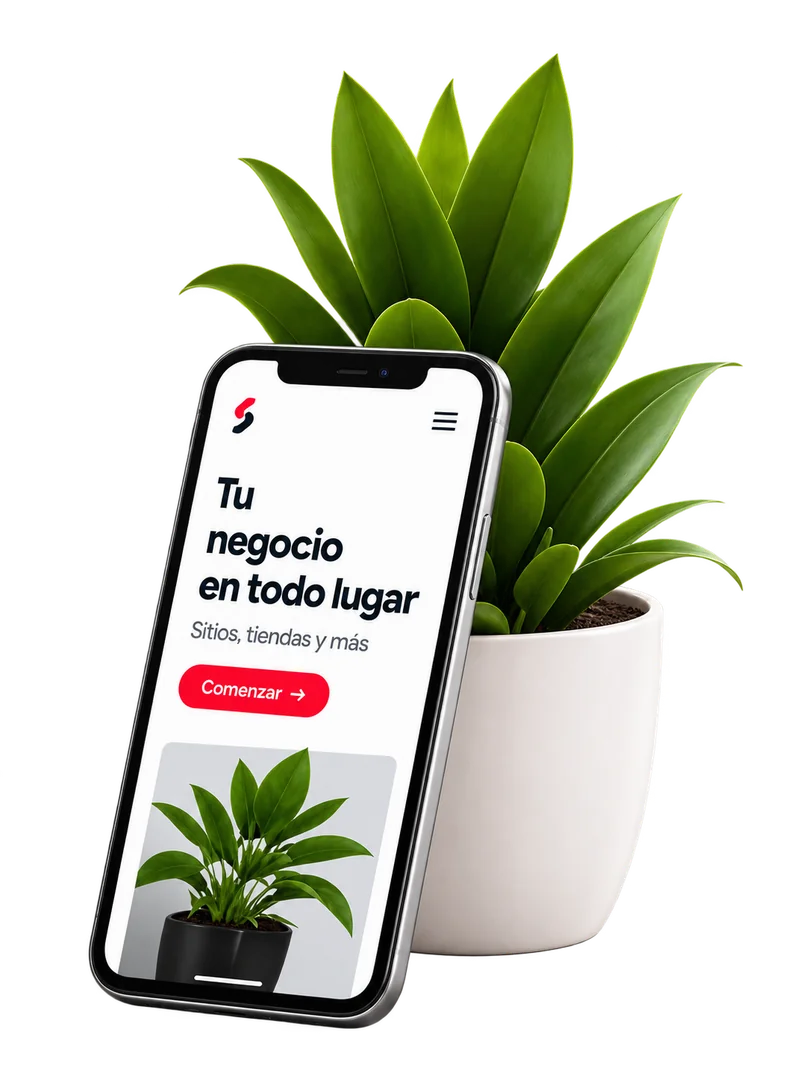 Mobile business website on a phone next to a plant
